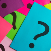 Set of coloured paper with question marks