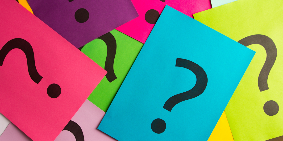 Set of coloured paper with question marks