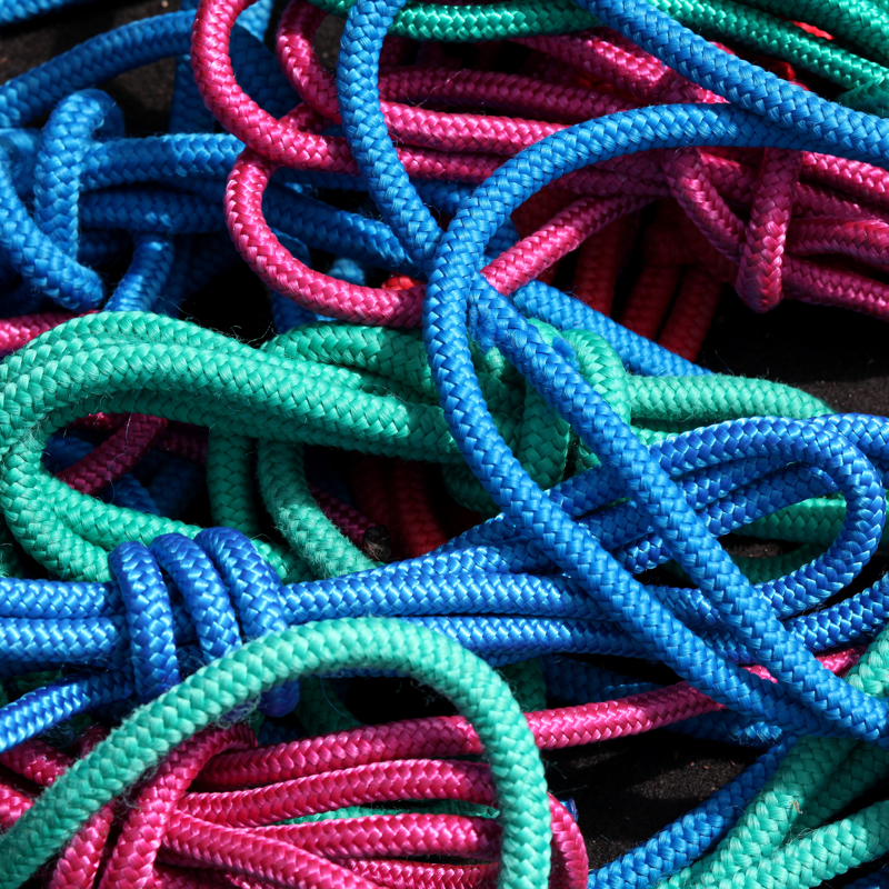 Tangled colourful climbing ropes as one of the best team-building tools