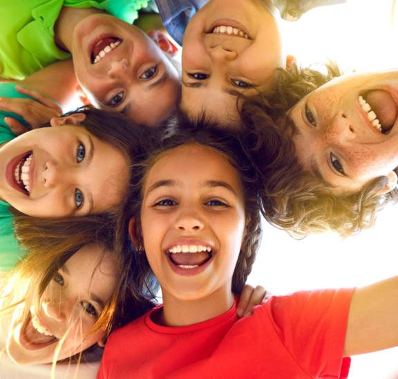 Happy children faces playing icebreakers and brain breaks