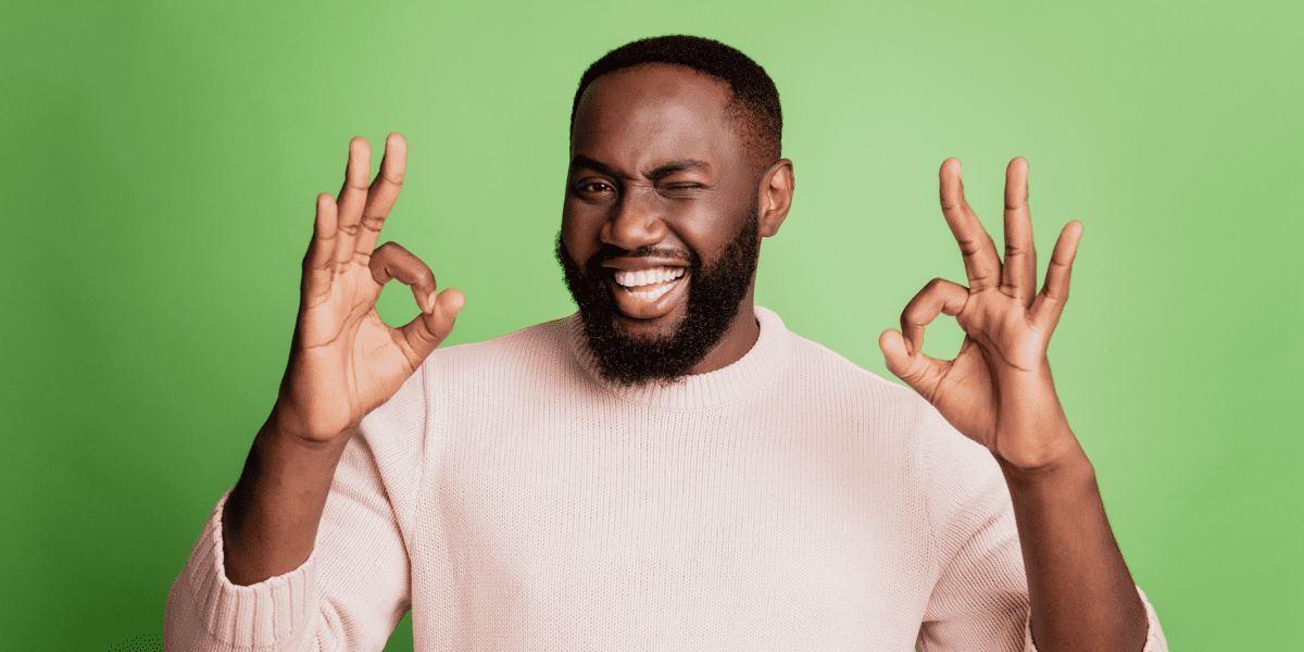 Happy man with okay hand sign